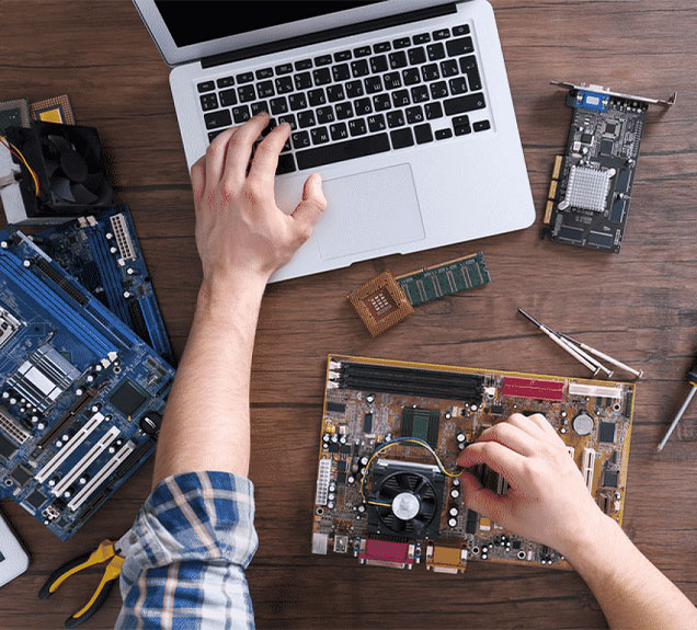 Technician working on laptop
